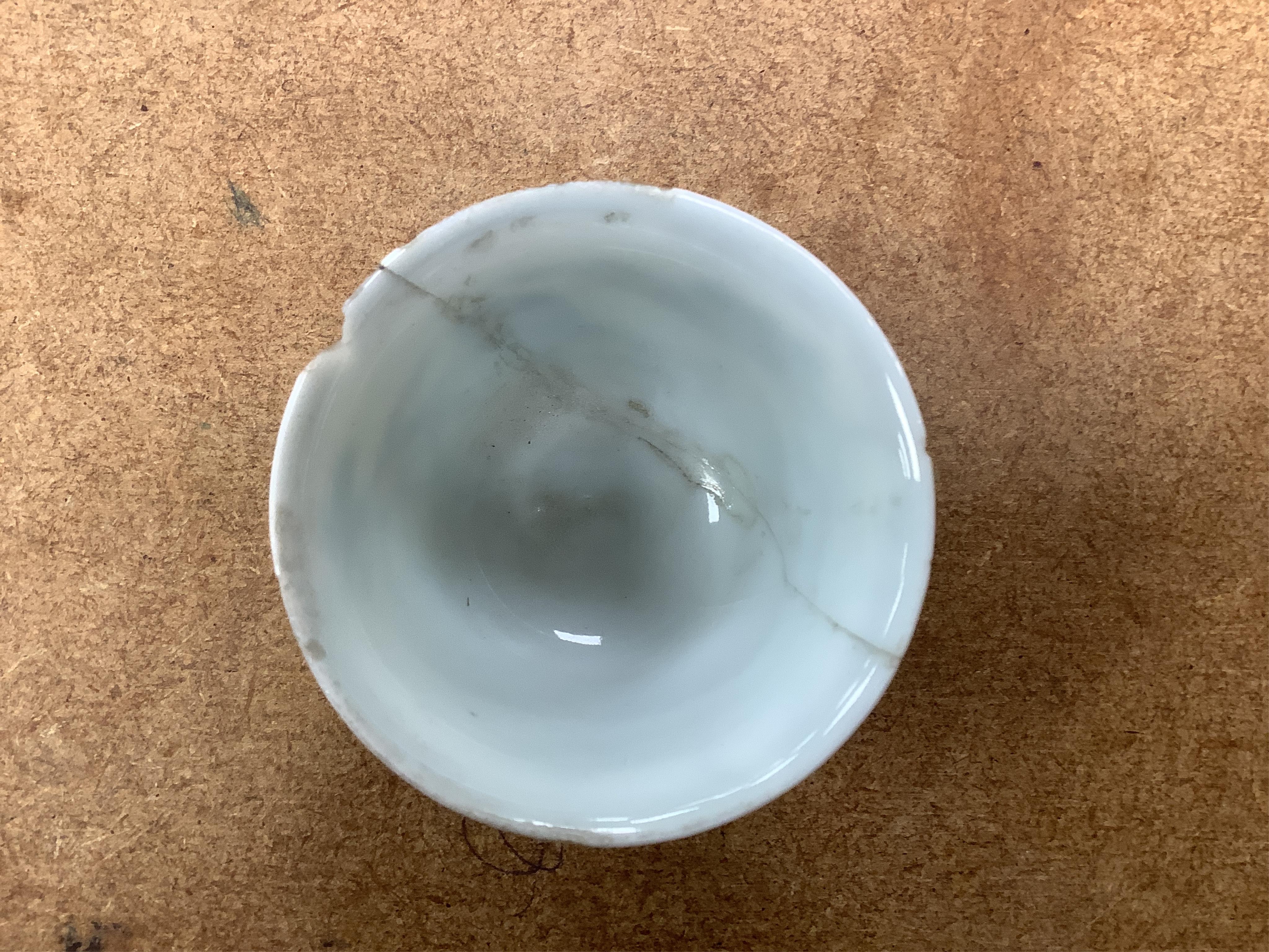 Two Chinese teacups, one Doucai with Chenghua mark, the other famille rose, tallest 4.5cm